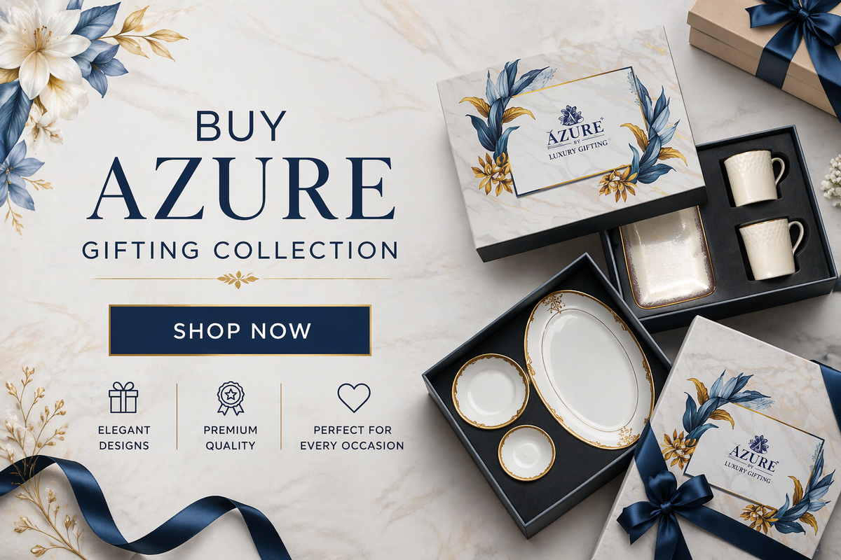 The Azure Collection luxury gifting collection featuring premium porcelain dinnerware, elegant tea cups, serving plates, and floral gift boxes with navy blue ribbons.